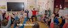 Schulklasse iM Sesselkreis bei einem Workshop